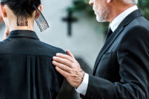 A Chesapeake wrongful death lawyer comforts a grieving client.