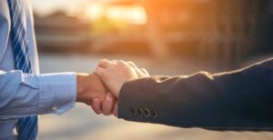 virginia-beach-personal-injury-lawyer-holds-the-hand-of-an-injured-victim